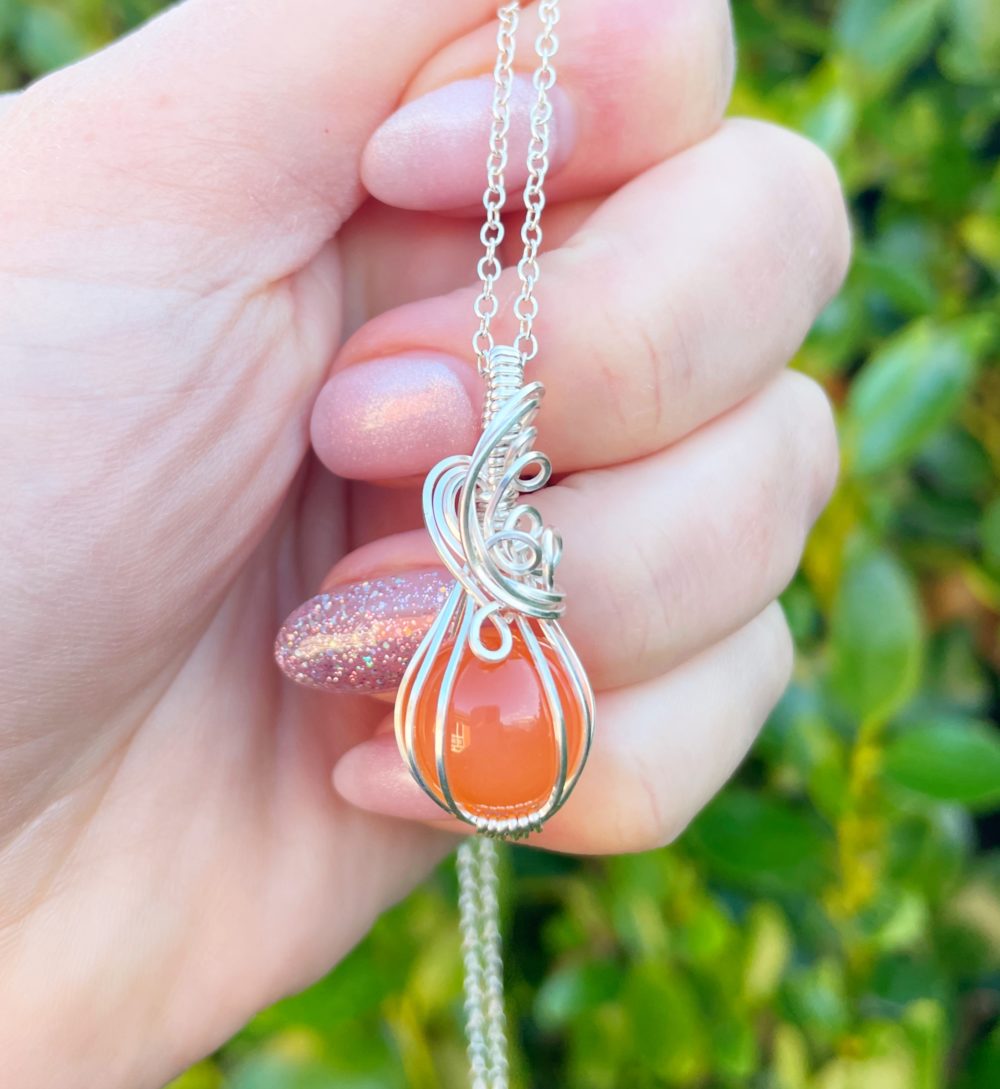 Carnelian sphere pumpkin pendant nz
