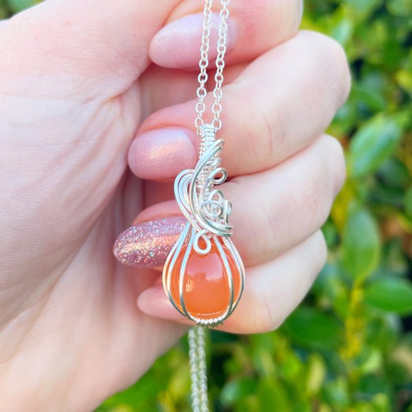 Carnelian sphere pumpkin pendant nz