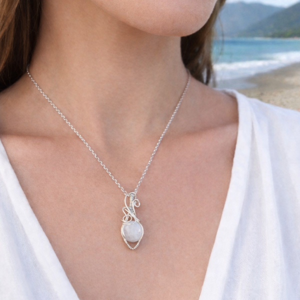 Moonstone mini, silver wrapped pendant