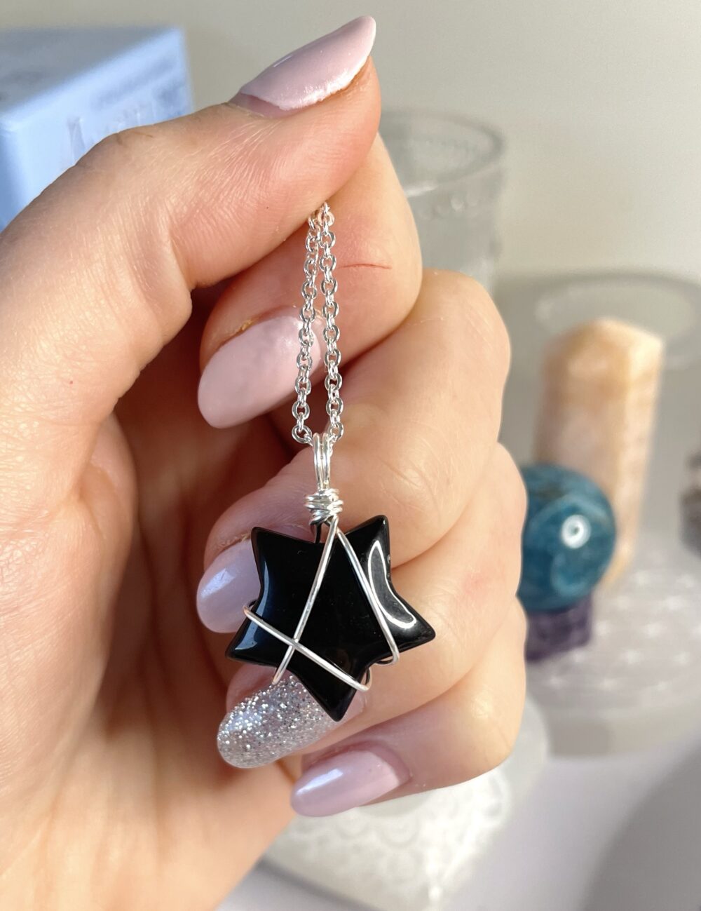 Black onyx wire wrapped star pendant